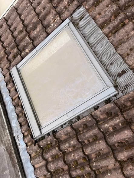 Velux roof window before cleaning in Bristol